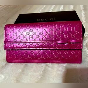 Like New, gently used Gucci wallet in box
